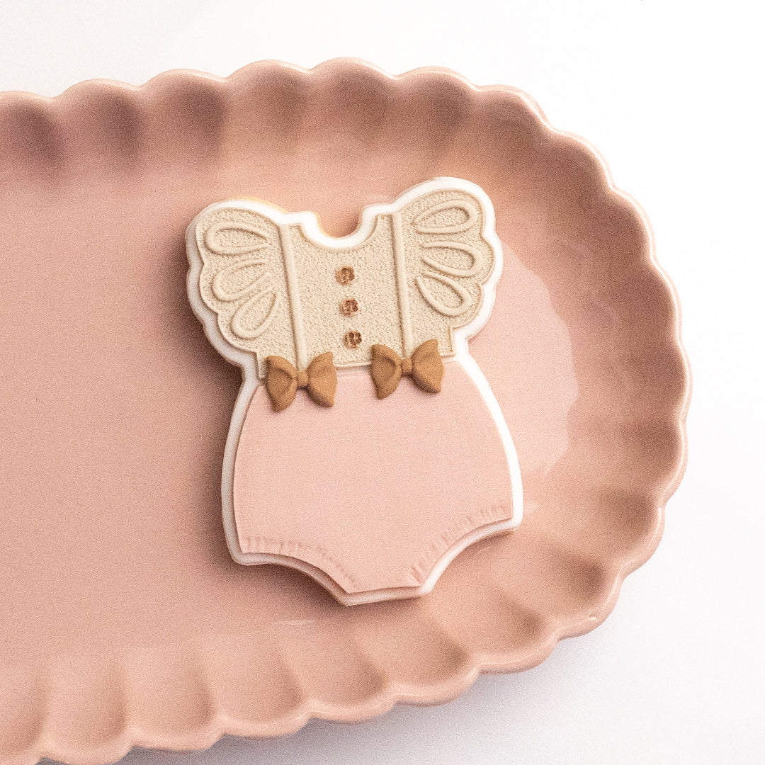 Romper stamp with matching cutter