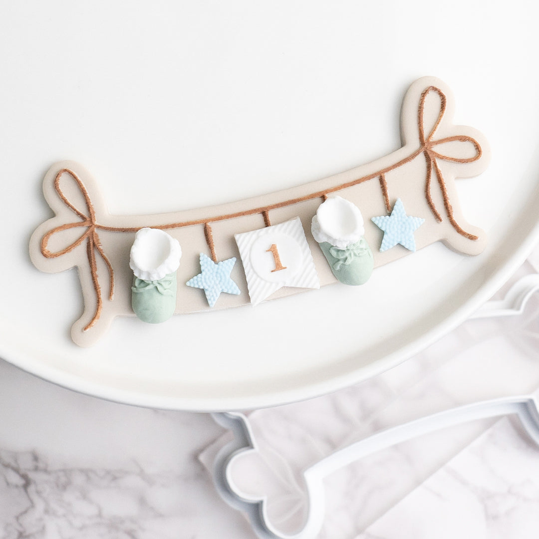 Bunting stamp with matching cutter