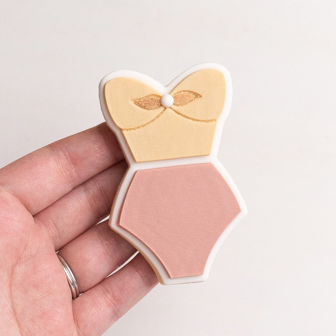 Swimsuit stamp with matching cutter
