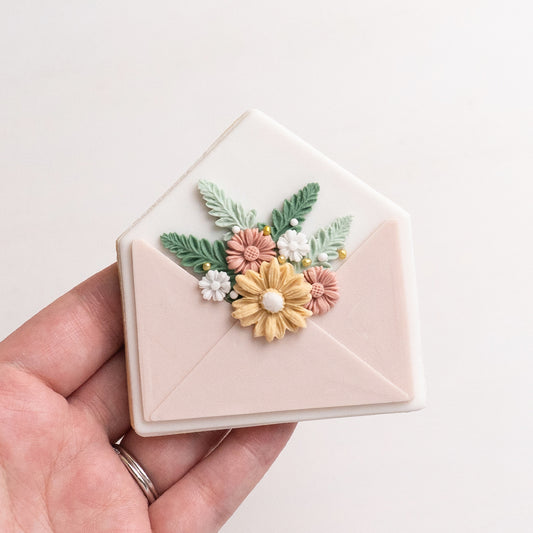 Envelope stamp with matching cutter