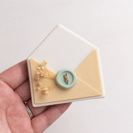 Envelope stamp with matching cutter
